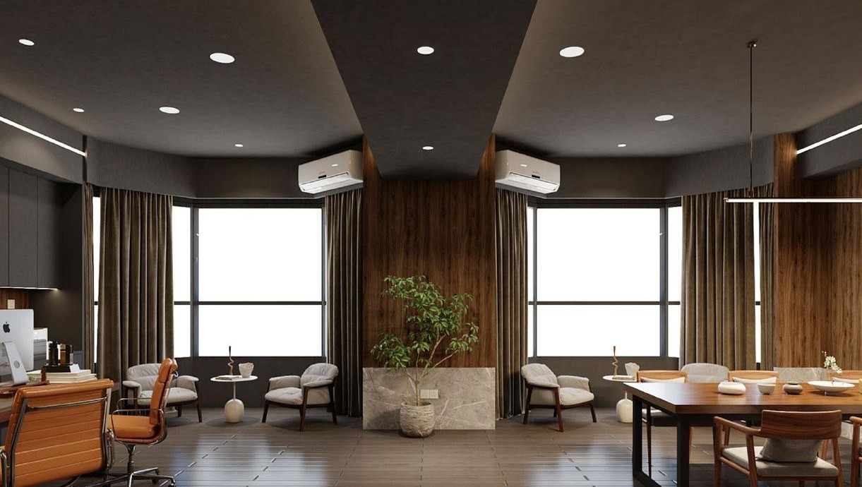 Lounge corner with armchairs by large windows